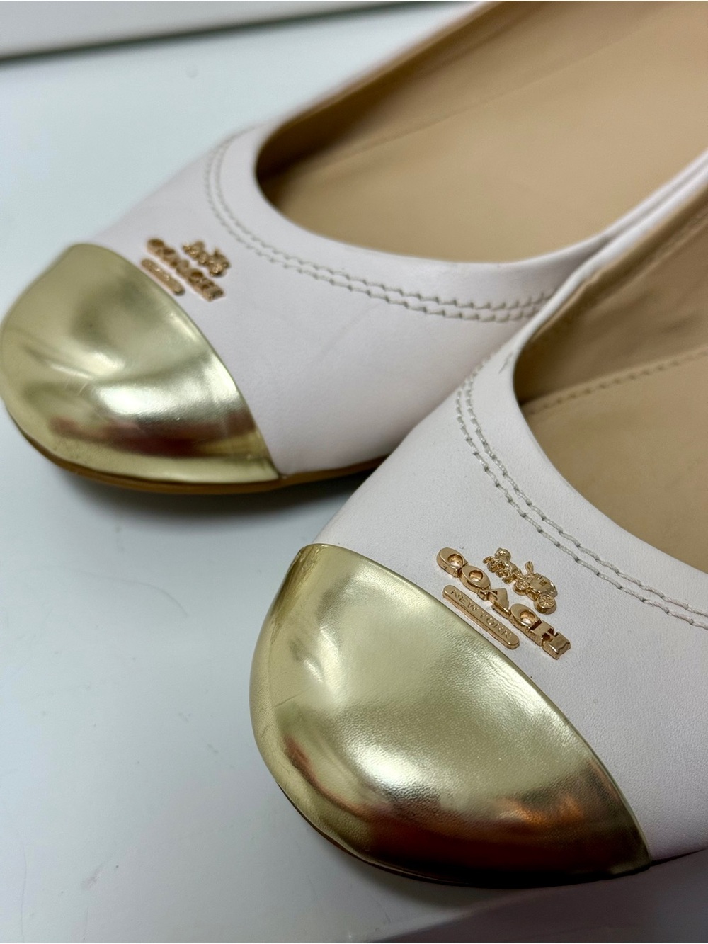 Coach Women's White Leather Ballet Flats with Gold Cap Toe
